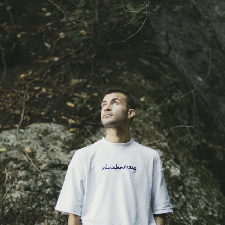 Kaveri Mehta, Lead Design Curator at Copper Willow Trail Lab, reviewing corporate floral arrangements